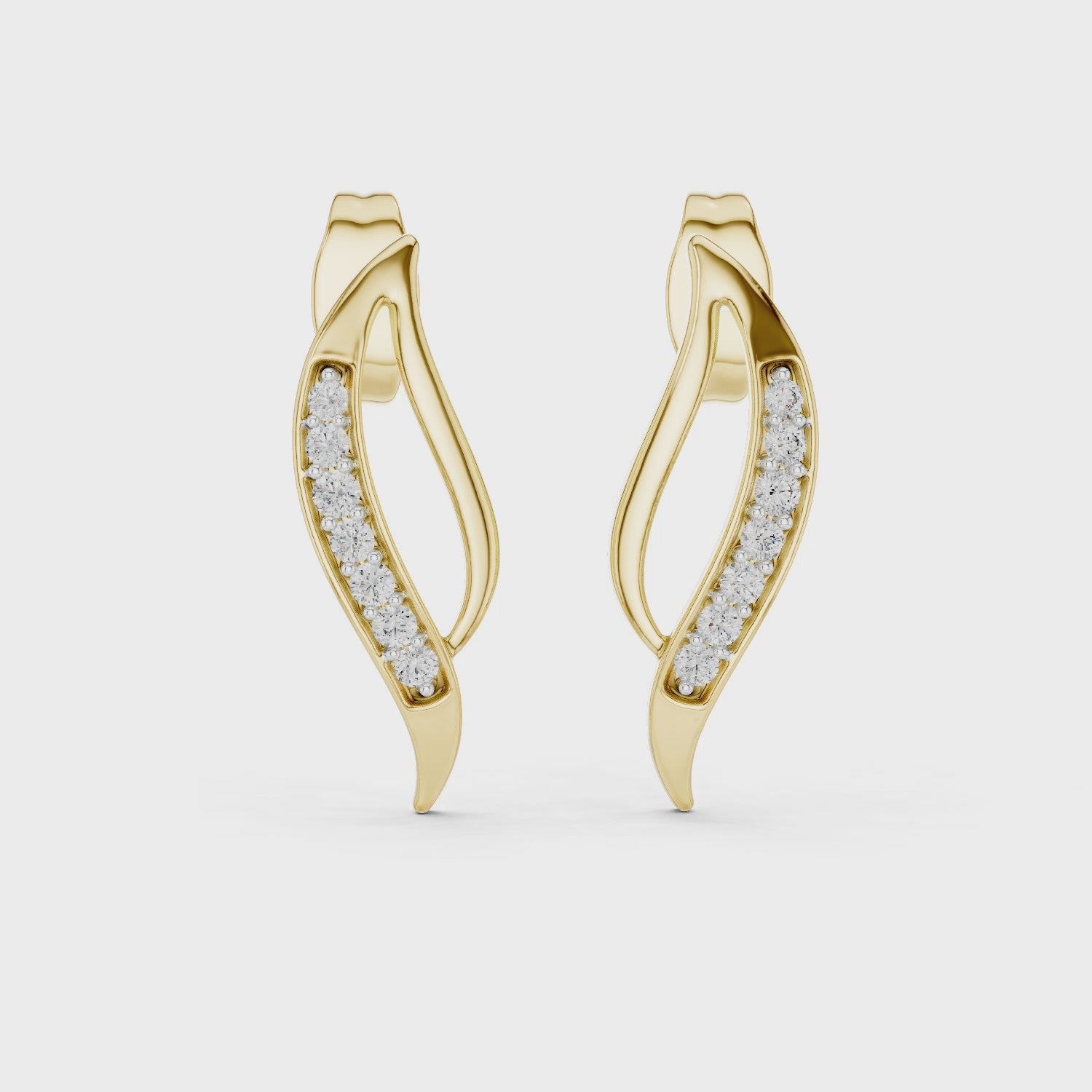 The Fluid Bow Moissanite Ribbon Stud Earrings